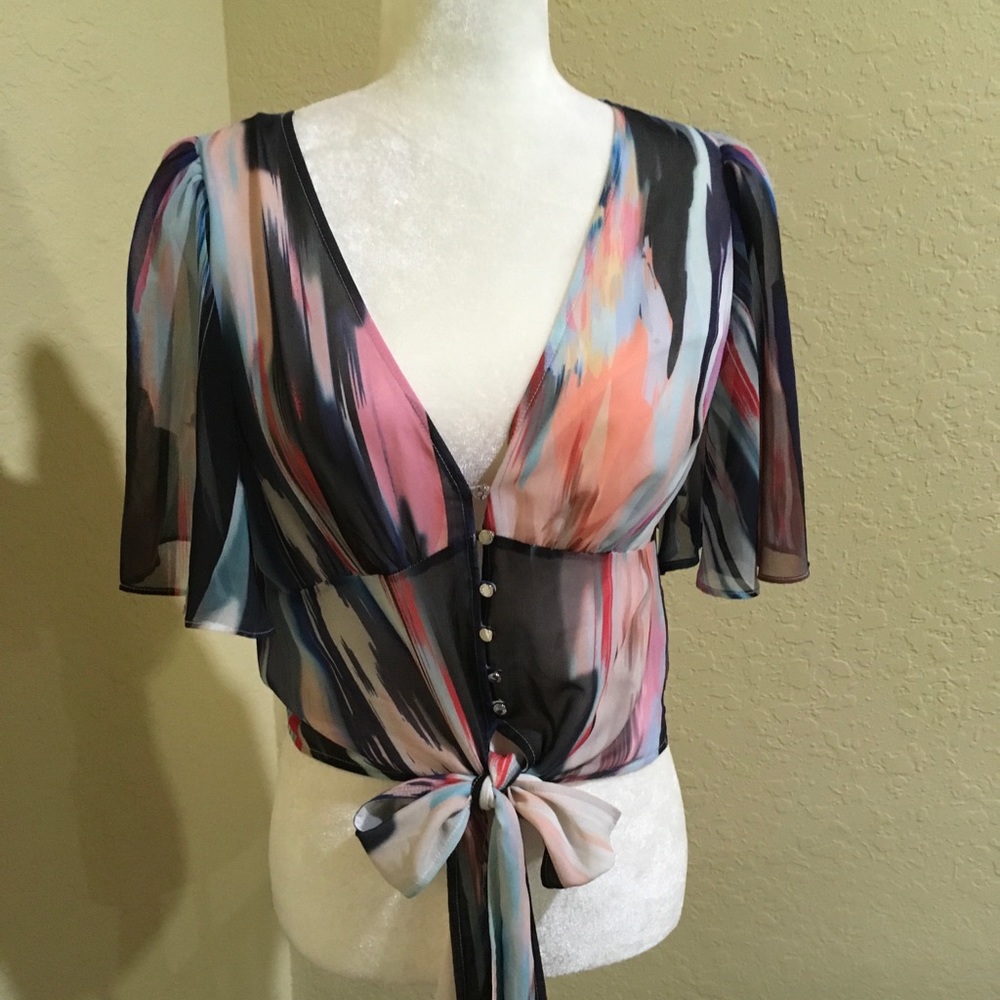 Bebe multi-colored wrap blouse.